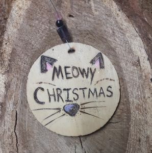 Woodburnt painted ornament